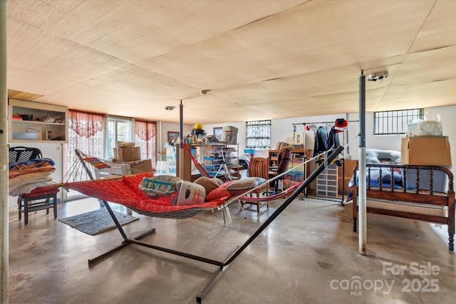 dining area featuring finished concrete flooring