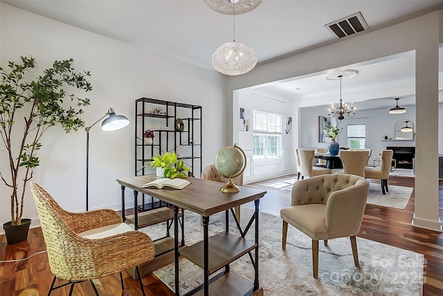 5713 Falkirk Ln, Matthews, NC 28104 - office area featuring a chandelier and wood finished floors