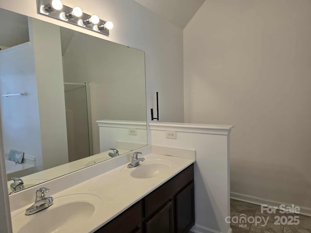 5713 Falkirk Ln, Matthews, NC 28104 - bathroom with double vanity, a shower with shower door, and tile patterned flooring