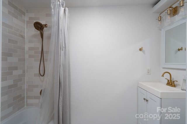 bathroom with shower / tub combo with curtain and vanity