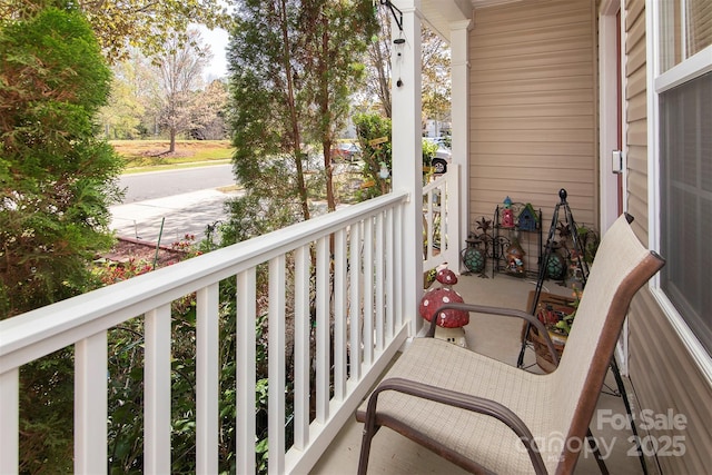 5127 Fernhill Dr, Charlotte, NC 28217 - balcony featuring a porch