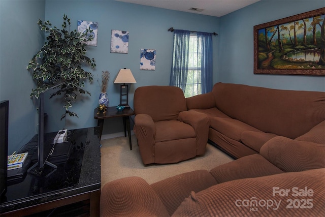 5127 Fernhill Dr, Charlotte, NC 28217 - carpeted living room featuring visible vents