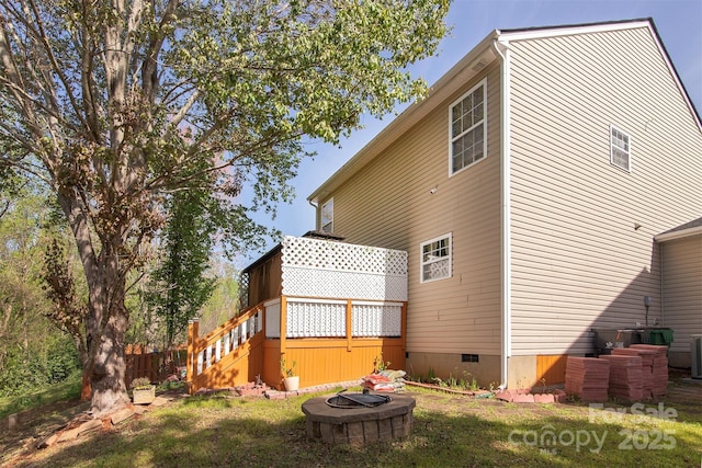 5127 Fernhill Dr, Charlotte, NC 28217 - back of house with stairway and crawl space