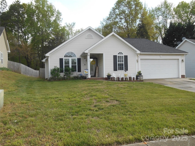 single story home with concrete driveway, a front yard, fence, and an attached garage
