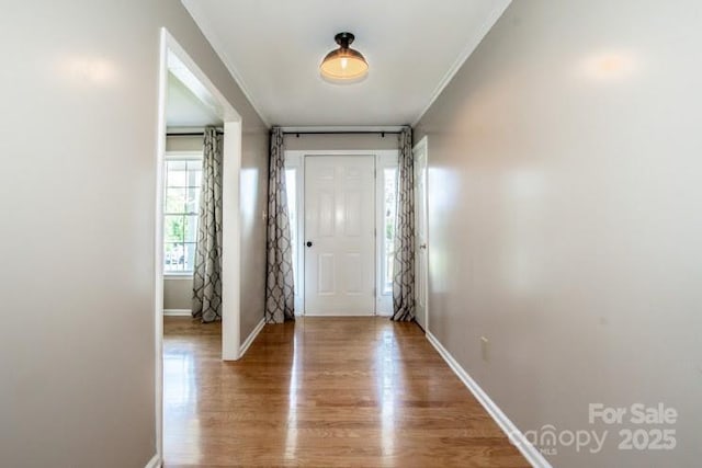 2811 Saint James Church Rd, Denver, NC 28037 - entryway with wood finished floors, baseboards, and ornamental molding