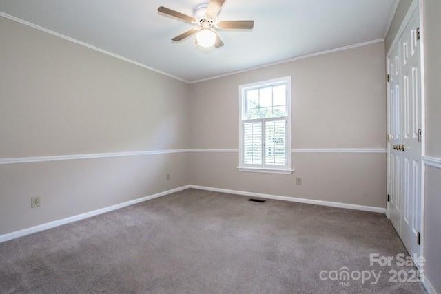2811 Saint James Church Rd, Denver, NC 28037 - spare room featuring carpet floors, ceiling fan, baseboards, and ornamental molding