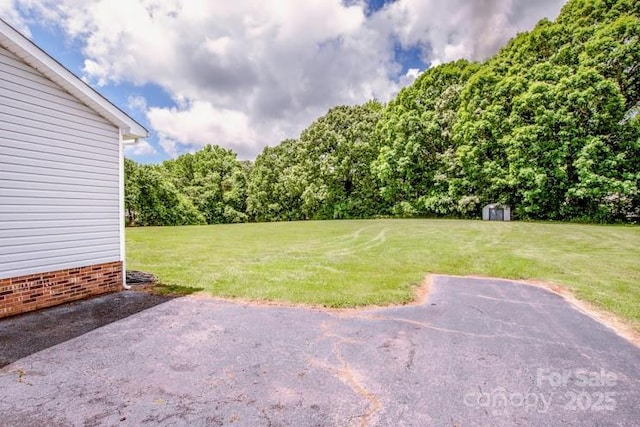 2811 Saint James Church Rd, Denver, NC 28037 - view of grassy yard featuring a patio