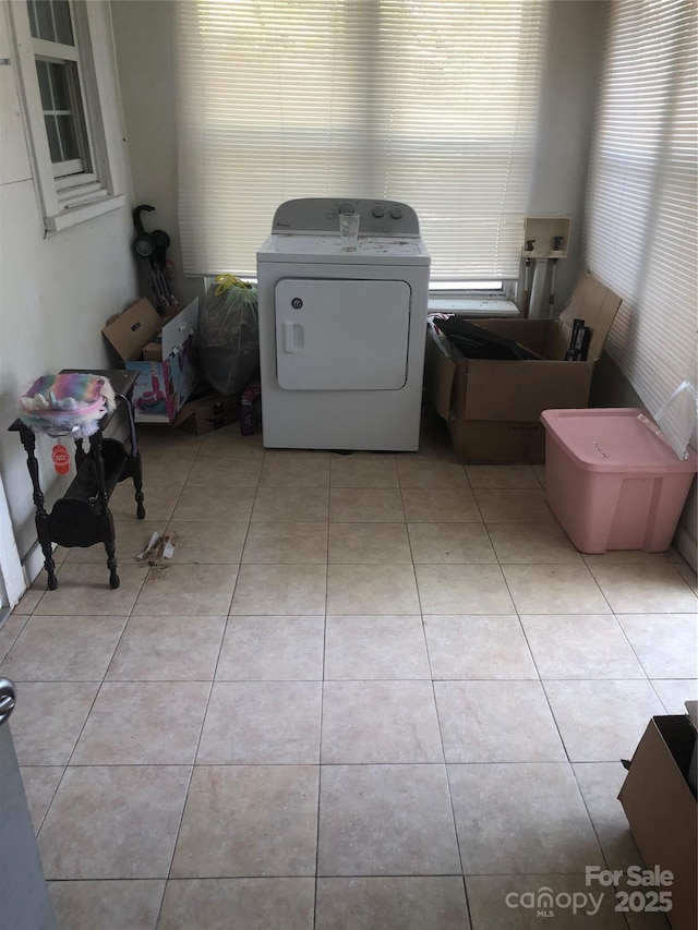 401 Plymouth St, Kannapolis, NC 28083 - clothes washing area featuring washer / clothes dryer, laundry area, and light tile patterned floors