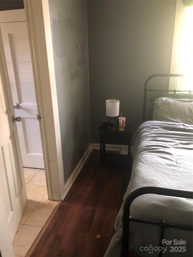 401 Plymouth St, Kannapolis, NC 28083 - bedroom featuring light wood-style floors and baseboards