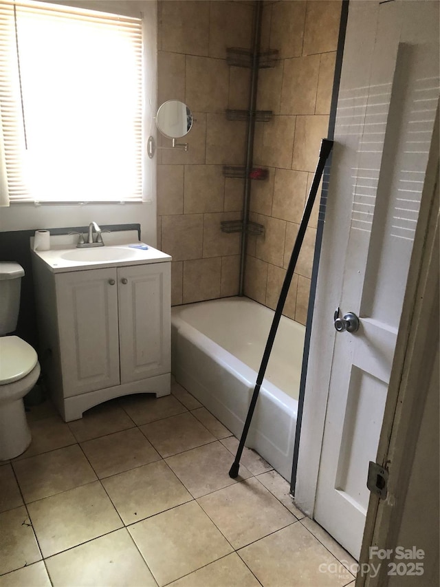 401 Plymouth St, Kannapolis, NC 28083 - full bathroom featuring toilet, tile patterned floors, vanity, and shower / bath combination