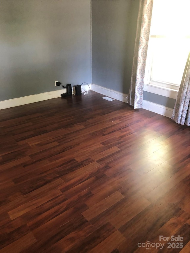 401 Plymouth St, Kannapolis, NC 28083 - empty room with baseboards and dark wood finished floors