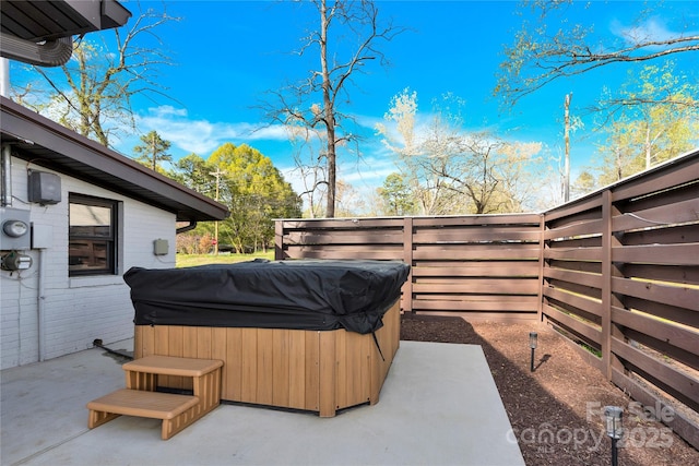 403 Greenbriar Rd S, Statesville, NC 28625 - view of yard featuring a patio area, a fenced backyard, and a hot tub