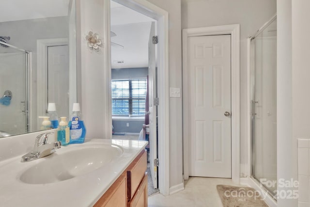 full bath featuring visible vents, a shower stall, vanity, and tile patterned flooring