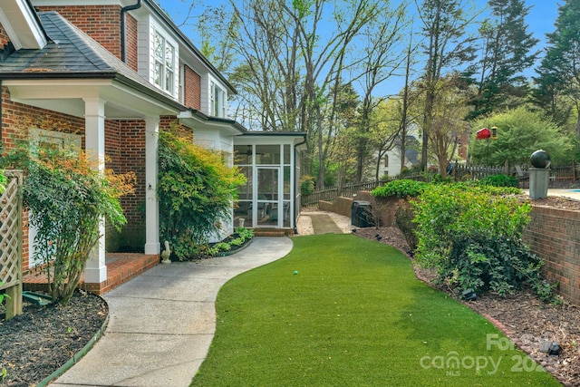 5750 Hemby Rd, Matthews, NC 28104 - view of yard featuring fence and a sunroom