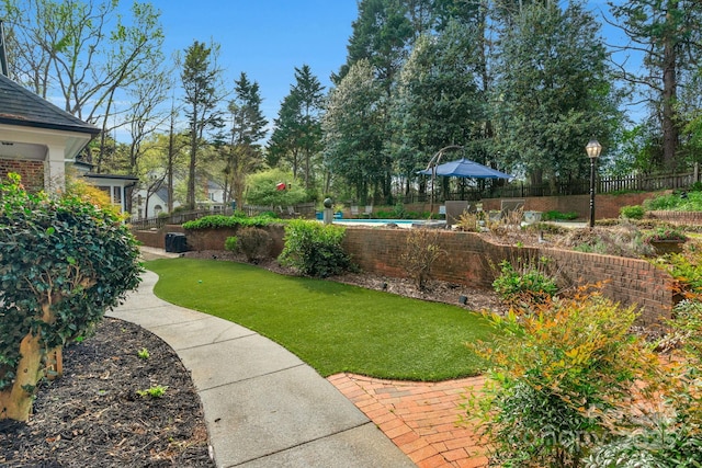 5750 Hemby Rd, Matthews, NC 28104 - view of yard with a fenced in pool and fence