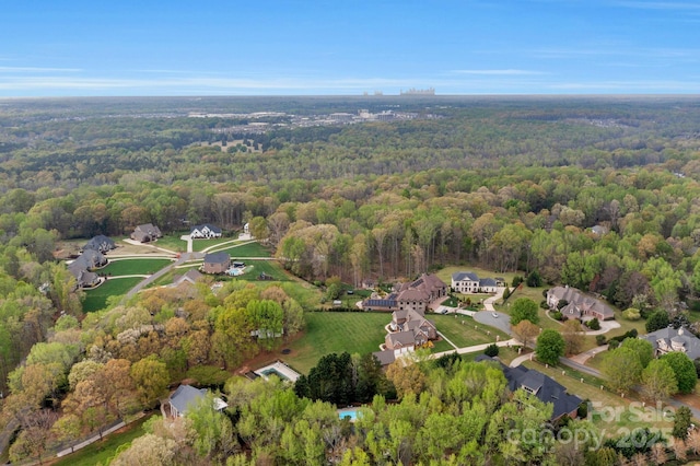 5750 Hemby Rd, Matthews, NC 28104 - birds eye view of property featuring a forest view