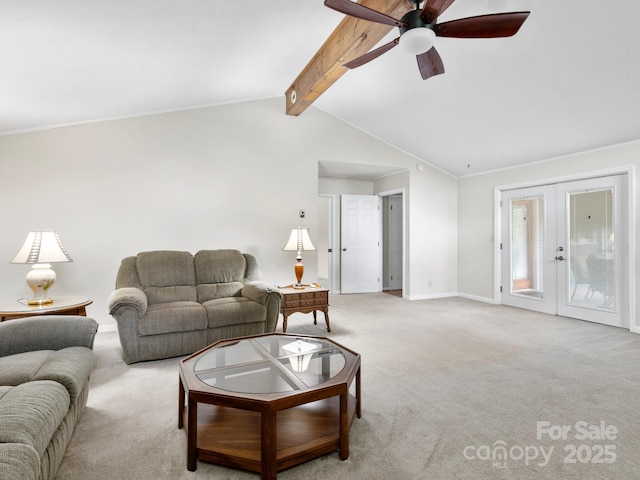 living area featuring baseboards, a ceiling fan, french doors, vaulted ceiling with beams, and light colored carpet