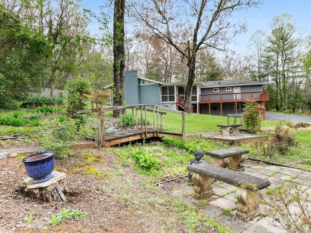 view of yard with a deck