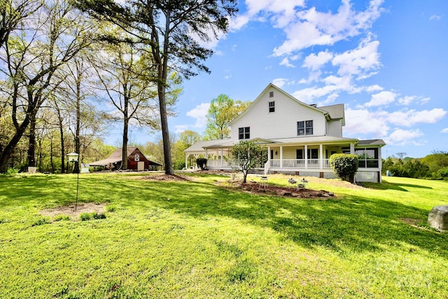 1151 Trull Hinson Rd, Wingate, NC 28174 - back of property featuring covered porch and a yard