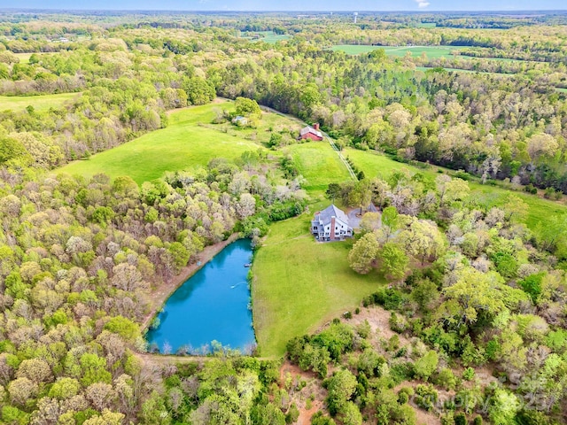 1151 Trull Hinson Rd, Wingate, NC 28174 - drone / aerial view of a nearby body of water and a heavily wooded area