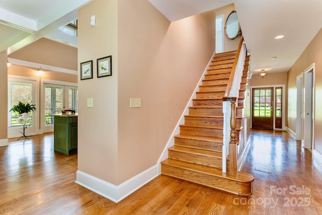 1151 Trull Hinson Rd, Wingate, NC 28174 - stairway with wood finished floors and recessed lighting