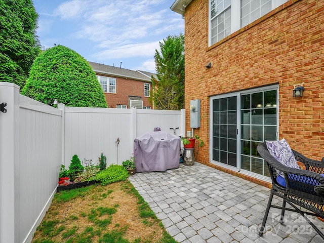 view of patio / terrace featuring a fenced backyard and grilling area
