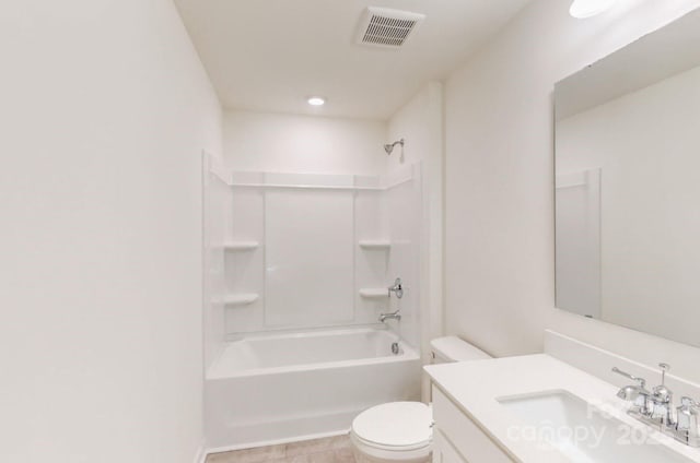 bathroom with visible vents, toilet, vanity, tile patterned flooring, and bathing tub / shower combination