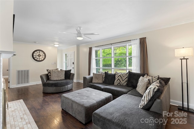 living area with wood finished floors, visible vents, crown molding, baseboards, and ceiling fan