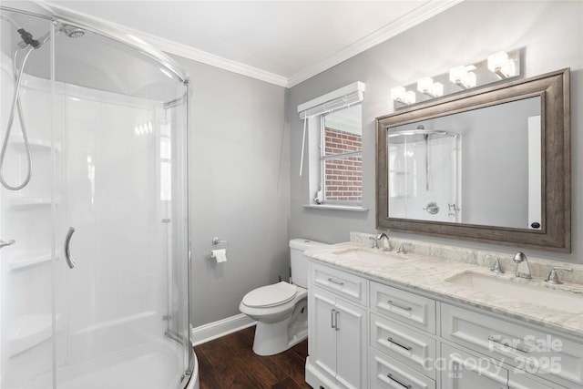 full bathroom featuring a shower stall, wood finished floors, and a sink