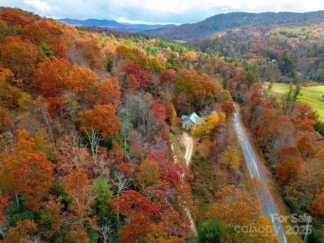 50 Honey Mountain Ln, Lake Toxaway, NC 28747 - bird's eye view of a heavily wooded area and a mountain backdrop