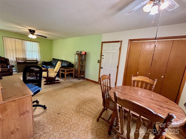 138 Friendship Dr, Ellenboro, NC 28040 - dining space with ceiling fan, baseboards, and a textured ceiling