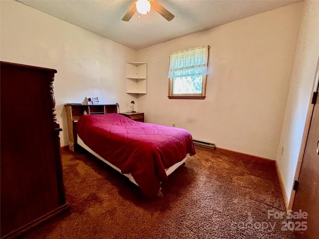 138 Friendship Dr, Ellenboro, NC 28040 - bedroom with a baseboard heating unit, baseboards, carpet flooring, a textured ceiling, and a ceiling fan