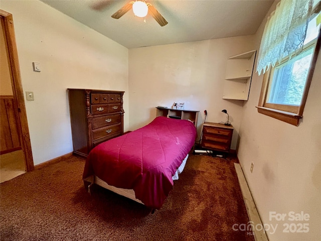138 Friendship Dr, Ellenboro, NC 28040 - carpeted bedroom with ceiling fan and baseboards