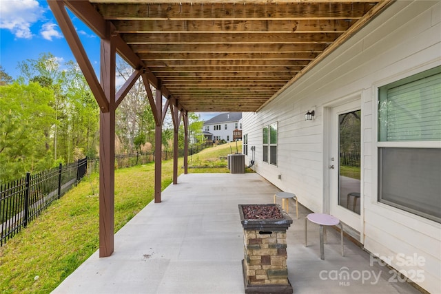 12305 Stinson Ct, Charlotte, NC 28277 - view of patio with central AC unit, a fenced backyard, and an outdoor fire pit