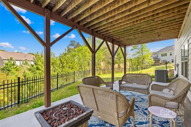 12305 Stinson Ct, Charlotte, NC 28277 - view of patio with central AC, an outdoor living space with a fire pit, and a fenced backyard