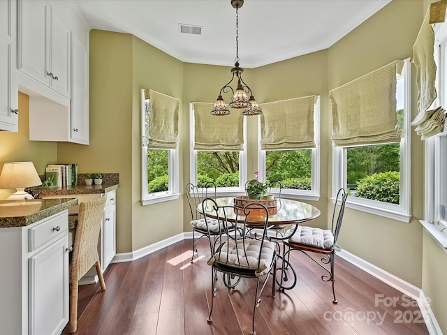 2516 Middlebridge Ln, Charlotte, NC 28270 - dining area with dark wood finished floors, visible vents, and baseboards