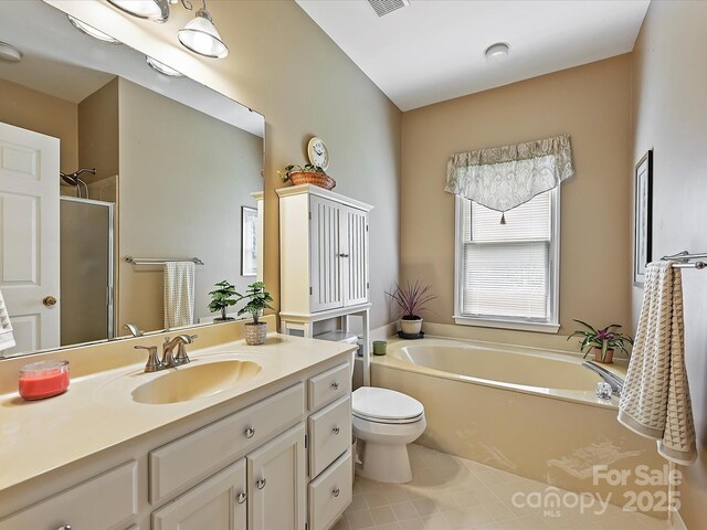 2516 Middlebridge Ln, Charlotte, NC 28270 - bathroom featuring a stall shower, toilet, a bath, tile patterned floors, and vanity