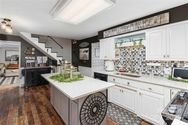 447 Henderson Rd, Chesnee, SC 29323 - kitchen featuring light countertops, a center island, dishwasher, and a sink
