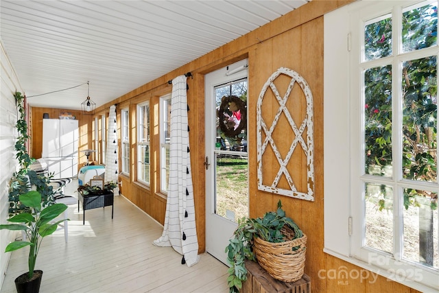 447 Henderson Rd, Chesnee, SC 29323 - sunroom featuring wood walls and hardwood / wood-style flooring