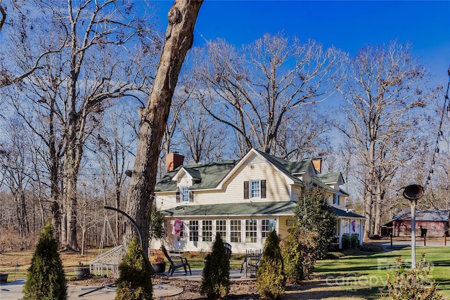 447 Henderson Rd, Chesnee, SC 29323 - view of front of home with a front lawn and a chimney