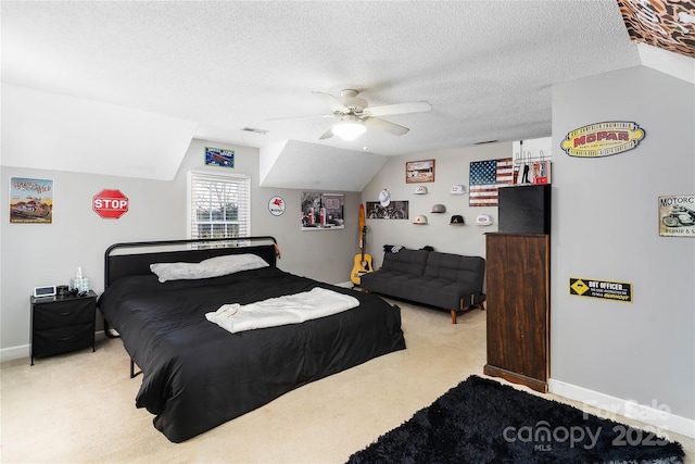 447 Henderson Rd, Chesnee, SC 29323 - bedroom with lofted ceiling, carpet flooring, a textured ceiling, visible vents, and ceiling fan