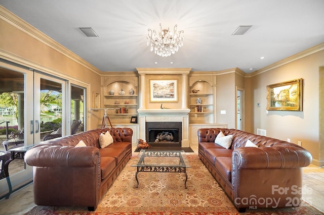 living room with crown molding, built in features, a notable chandelier, and a fireplace with flush hearth