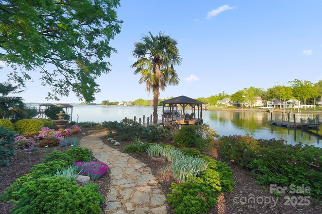 dock area with a water view