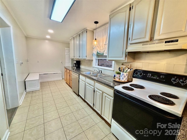 kitchen with dark countertops, under cabinet range hood, range with electric stovetop, dishwasher, and a sink