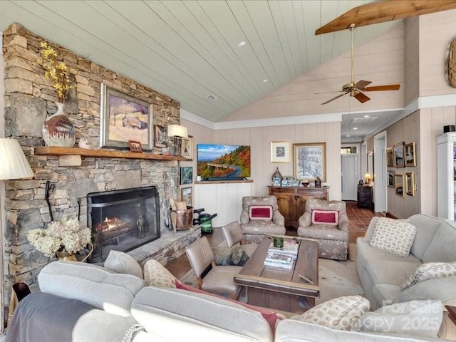 116 Dana Rd, Waynesville, NC 28786 - living area with ceiling fan, a fireplace, vaulted ceiling, wood ceiling, and wood walls