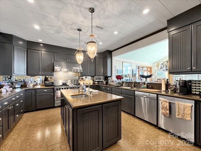 116 Dana Rd, Waynesville, NC 28786 - kitchen featuring under cabinet range hood, decorative light fixtures, visible vents, appliances with stainless steel finishes, and a sink