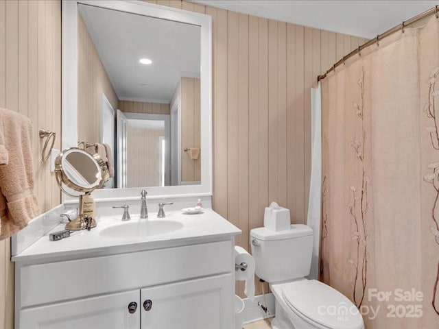 116 Dana Rd, Waynesville, NC 28786 - bathroom with wood walls, vanity, a shower with curtain, and toilet