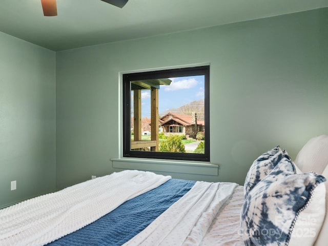 bedroom featuring ceiling fan
