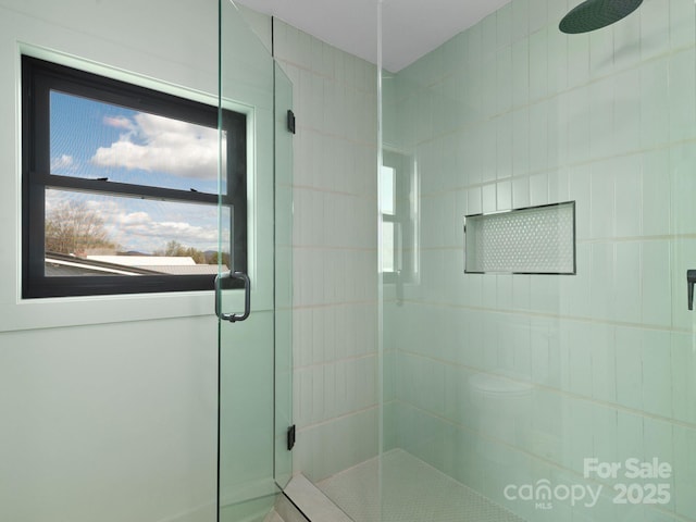 bathroom featuring a stall shower