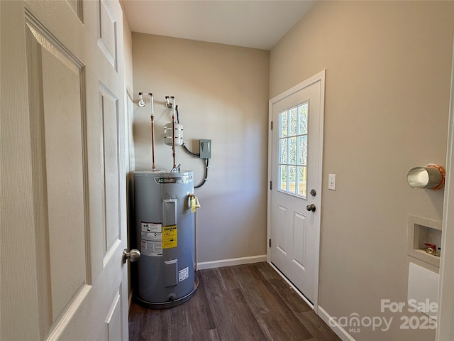 interior space featuring water heater, baseboards, and dark wood-type flooring